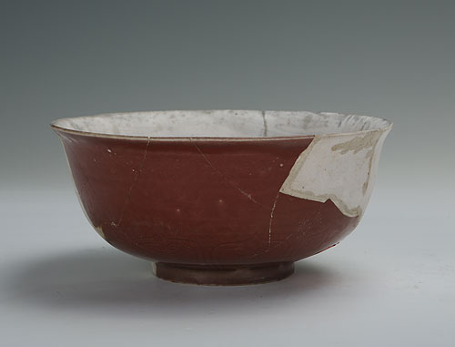 Red glazed stamping bowl