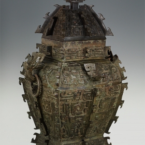 Shang Dynasty (1600 BC -1046 BC), Height: 88cm; length of the mouth: 26.1cm; width of the mouth: 21.6cm Unearthed at Maoshanyu, Shuitian Town,Hunan Province in 1919. Lei is a kind of large ritualistic wine vessel which was popular from the late Shang Dynasty to the late Spring and Autumn Period. Bronze ‘Min’Fanglei (wine vessel) with inscriptions