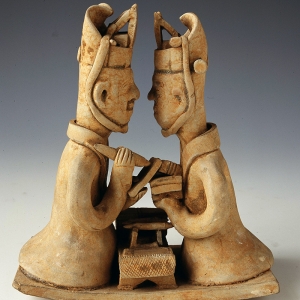 In the second year of the Yongning reign (302 AD), Western Jin Dynasty (265–316 AD) Height: 17.2cm; length of the bottom board: 15.5cm, width: 7.8cm Unearthed from Tomb No.9 at Jinpenling, Changsha City, Hunan Province in 1958. Stoneware figurines transcribing and proofreading